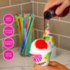 Hawaiian Shaved Ice Syrup Assortment with 3 - 16oz Bottles, 25 Snow Cone Cups, 25 Spoon Straws, and 3 Pouring Spouts. Flavors: Cherry, Blue Raspberry, and Grape. Allergy-friendly. view 3