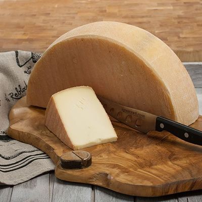 Authentic French Raclette Cheese Whole Wheel, 12 Lbs, Semi-Soft Texture, Ideal for Melting, Perfect for Gourmet Cooking, Product of France