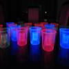 DIRECTGLOW LLC 4oz 20ct Assorted Blacklight Reactive Soft Plastic Bomber Shot Glasses view 1