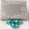 Scott's Cakes Dark Chocolate Peanut Butter Truffle Cream Filling Candies with Aqua Foils in a 1 Pound Snowflake Box view 1