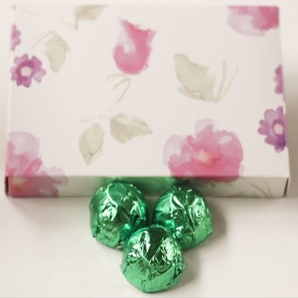Scott's Cakes Dark Chocolate Peanut Butter Truffle Cream Filling Candies with Light Green Foils in a 1 Pound Pastel Flower Box