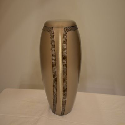 Large Brass Human or Pet Urn with Monarch Pewter Finished Pewter Design on Metal Brass with Size of 10 X 4 Inches. Some Products May Have Minor Scratches