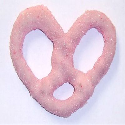 Scott's Cakes White Chocolate Covered Pretzels with Lite Pink Sugar in a 1 Pound Plastic Deli Container