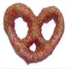 Scott's Cakes White Chocolate Covered Pretzels with Christmas Red and Green Sugar in a 1 Pound Clear Cello Bag view 1