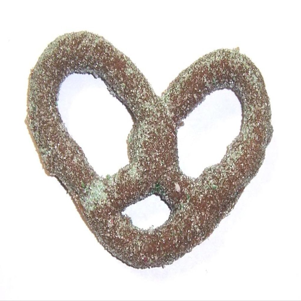 Scott's Cakes Milk Chocolate Covered Pretzels with Lite Green Sugar in a 1 Pound Clear Cello Bag