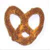 Scott's Cakes Milk Chocolate Covered Pretzels with Yellow and Orange Sugar in a 1 Pound Clear Cello Bag view 1