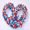 Scott's Cakes White Chocolate Covered Pretzels with 4th of July Sprinkles in a 1 Pound Plastic Deli Container view 1