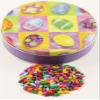 Scott's Cakes Rainbow Mix Chocolate Covered Sunflower Seeds in a Mini Bright Eggs Tin view 1