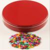 Scott's Cakes Rainbow Mix Chocolate Covered Sunflower Seeds in a Mini Metallic Red Tin view 1