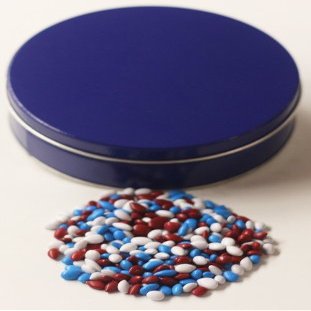 Scott's Cakes Patriotic Mix Chocolate Covered Sunflower Seeds in a Mini Solid Blue Tin