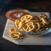 Pretzelphoria Knots of Garlic pretzel, 8 oz. view 2