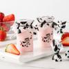 Restaurantware 4.5 Inch x 4 Inch Yogurt Jar Wrappers 500 With Rubber Band Wrappers For Pudding Containers - Grease Resistant Disposable Cow Print Plastic Chia Pudding Jar Covers Reuseable view 4