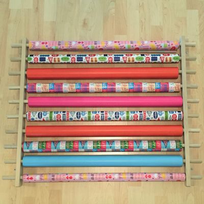 Z-Things Storage, Organizer, Dispensing Rack for Gift Wrapping Paper, Ribbons, Cellophane, Vinyl Rolls, Paper, Maps Etc. Holds 10 Rows. Adjustable Width. Easy Wall Mount. Hardware Included.
