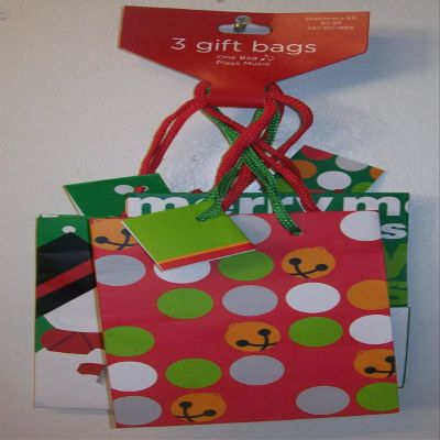 12 Christmas Gift Bags 5.5" t x 4.25" w x 2.5"