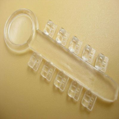 100Pcs SmileTech Dental Rotation Wedges Ligature Rotary Pad Orthodontic Elastic Rubber Bands