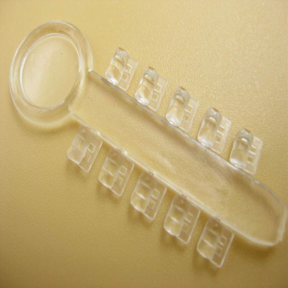 100Pcs SmileTech Dental Rotation Wedges Ligature Rotary Pad Orthodontic Elastic Rubber Bands