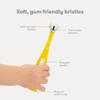 Frida Baby Triple-Angle Toothhugger Training Toddler Toothbrush | Toddler Toothbrush 2 Years and Up, Cleans All Sides at Once | Yellow view 4