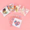 Bskifnn 400PCS Valentine Cellophane Bags Love Heart Printed Self Adhesive Cookie Treat Bags Gift Bags for Valentine's Day Party Supplies 4 Styles Valentine's Day Mother's Day view 4