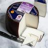 igourmet Drunken Goat Spanish Cheese and Cheese Storage Bag - Whole Wheel (4.5 pound) - Drunken Goat Cheese is mild and smooth, not goaty, with a touch of fruitiness in the finish view 1