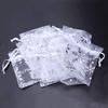 100 PCS Wedding Gift Bags Drawstring Jewelry Bags Silver White Snowflakes Sheer Favor Bags view 4