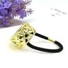 Hollow letter metal horsetail buckle hair accessories for ladies alloy tie hair rubber band high-end hair ring (gold) view 2