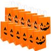 12 Pieces Halloween Pumpkin Gift Bags Trick or Treat Kraft Paper Candy Goodie Bags with Handle for Halloween Party Favors Supplies view 1