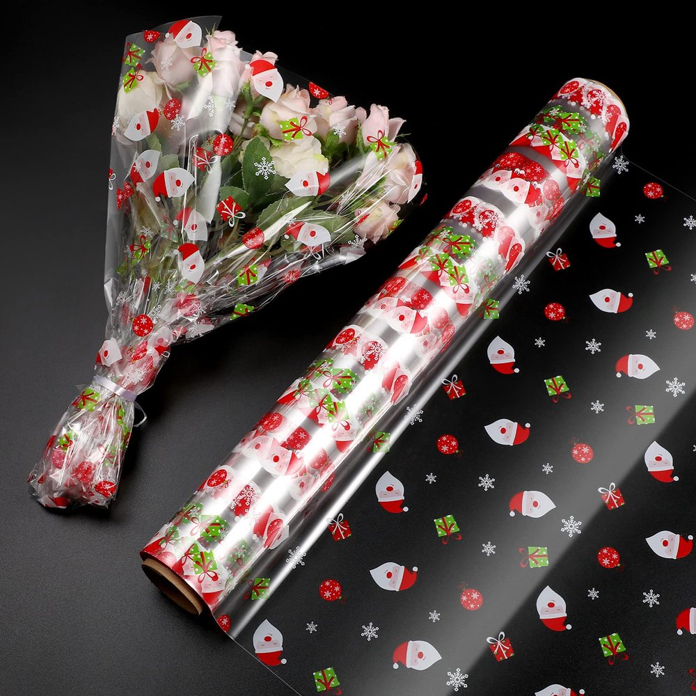 Toyvian Christmas Cellophane Wrap Roll - Santa Claus Pattern Cellophane Wrapping Paper, 100 Ft X 15.7 Inch, 2.5 Mil Thickness Xmas Clear Wrap Roll for Gift Baskets Crafts Flower Treat Packing