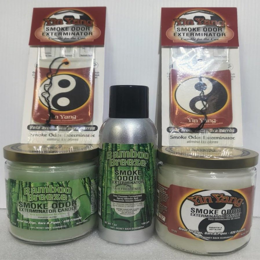 Smoke odor Exterminator Bamboo Breeze, Includes Two 13 oz Jar Candle One 7 oz Spray & Two Car Hangers All in One Bundle.