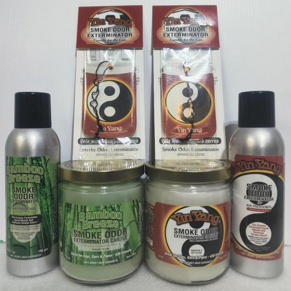 Smoke odor Exterminator Bamboo Breeze, Includes Two 13 oz Jar Candle Two 7 oz Spray & Two Car Hangers All in One Bundle.