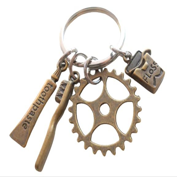 JewelryEveryday Dental Assistant, Dental Office Staff, Orthodontics Employee Thank You Keychain; Bronze Toothbrush, Floss & Gear Charm Keychain
