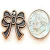10Pcs. Tibetan Antique Copper RIBBON Bow Gift Wrap Charms Ear Drops CH63 charm original view 2