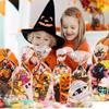 Suloli Halloween Cellophane Treat Bags - 120pcs Clear Candy Bags with Pumpkin, Ghost Designs and 150 Twist Ties for Kids' Trick or Treat Party Favors view 4