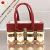 Ghasitaram Gifts Rakhi Gifts for Brothers Apex Wooden Box of 4 Dryfruits Jars with 2 Green Beads Rakhis view 1