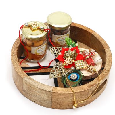 Ghasitaram Gifts Rakhi Gifts for Brothers Round Printed Tray of 2 Jars of Choco Almonds, Crunchy Cashews, Roli Chawal Thali and Bhaiya Bhabhi Rakhis
