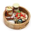 Ghasitaram Gifts Rakhi Gifts for Brothers Round Printed Tray of 2 Jars of Choco Almonds, Crunchy Cashews, Roli Chawal Thali and Bhaiya Bhabhi Rakhis view 1
