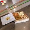 Ghasitaram Gifts Rakhi Gifts for Brothers Wooden Metal Box of 4 Dryfruits with 2 Green Beads Rakhis view 1