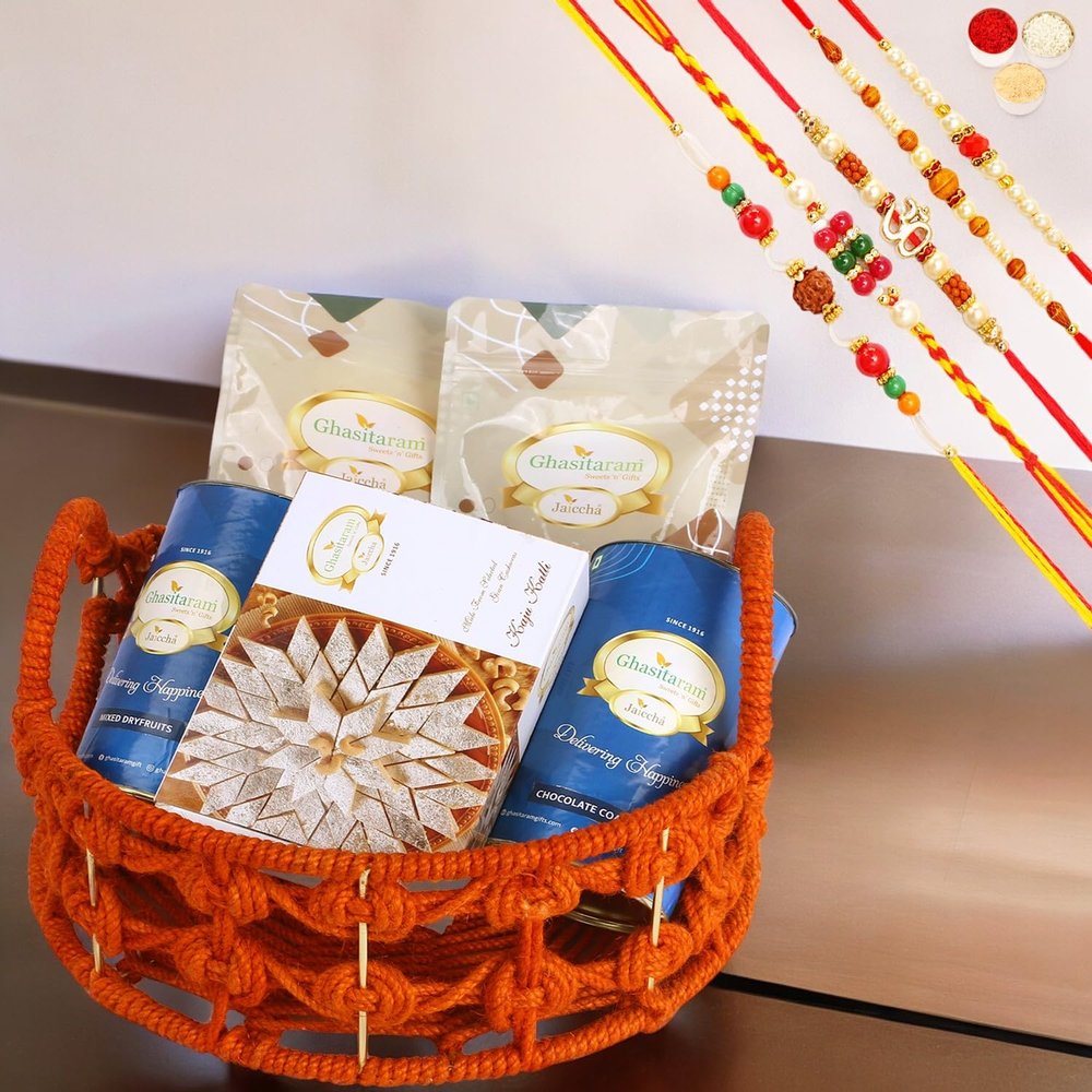 Ghasitaram Gifts Rakhi Gifts for Brothers Orange Jute Basket of assortments with Kaju Katli with 5 rakhis