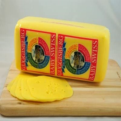 Guggisberg Baby Swiss. Deli Loaf. about 6 LB.