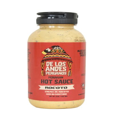 Aji de los Andes Peruanos Crema de Rocoto 8.0 oz Experience the perfect balance of heat and creaminess with our Rocoto Hot Pepper Sauce. Crafted with the finest ingredients, this sauce delivers a bold flavor that will leave your taste buds craving mo