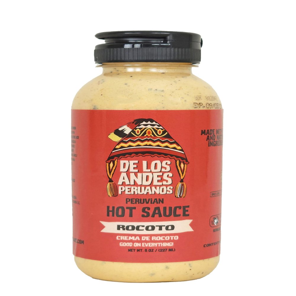 Aji de los Andes Peruanos Crema de Rocoto 8.0 oz Experience the perfect balance of heat and creaminess with our Rocoto Hot Pepper Sauce. Crafted with the finest ingredients, this sauce delivers a bold flavor that will leave your taste buds craving mo