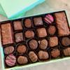 1 lb of gourmet assorted chocolate candies. A milk and dark chocolate fancy candy gift box of english toffee, chocolate covered cherries, soft center creams, and sea salt caramel chews view 1