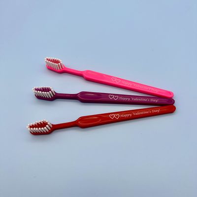 Tess Oral Health Valentine Toothbrush for Child - Fun and Gentle Oral Care for Kids - Shows 2 Hearts and Reads 'Happy Valentine's Day' - Festive Red, Purple and Pink Design - 12 Toothbrushes