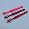 Tess Oral Health Valentine Toothbrush for Child - Fun and Gentle Oral Care for Kids - Shows 2 Hearts and Reads 'Happy Valentine's Day' - Festive Red, Purple and Pink Design - 12 Toothbrushes view 2