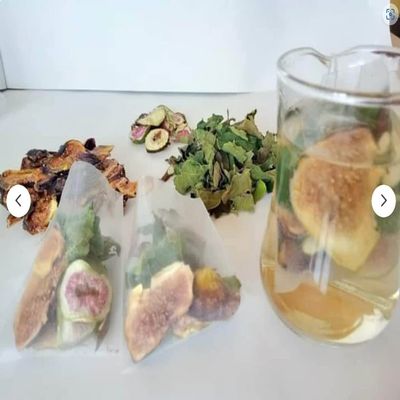 12 Organic 5 gram Fig Tea Bags with dried leaves and sliced fruit in a Resealable Bag