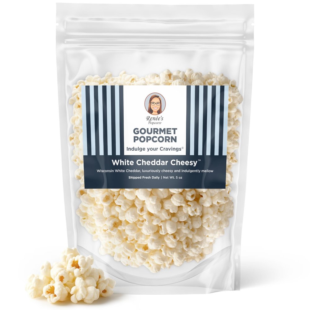 Renes White Cheddar Cheesy Gourmet Popcorn  real Wisconsin white Cheddar cheese is smooth and creamy on fresh popped corn, snack or gift  resealable, 5oz bag.