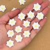 12 Mini Icing Poinsettias by Simply Sucr | Royal Icing Christmas Flower Decorations | Edible Holiday Cupcake Toppers (All White, 12 Flowers) view 1