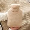 1L hot water bottle with bag for hands 1Pcs hot water bottle with fashionable cover hot water bottle with soft cover soft and comfortable plush cover PVC hot water bottle for children and adults view 1