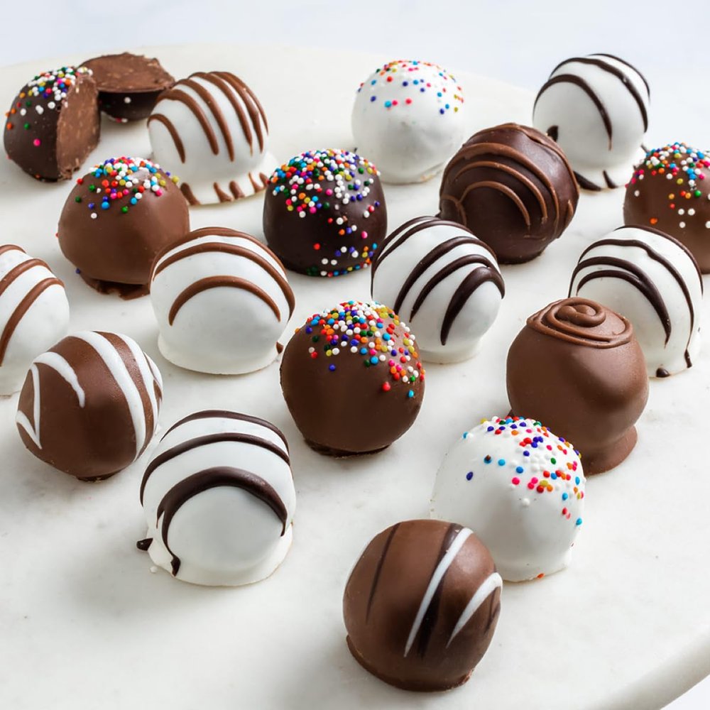 Brownie Points Brownie Bruffles: 18-Individually Wrapped Brownie Bruffles. Brownie Bruffle is a Brownie rolled in Ganache, cream cheese and wrapped in a rich chocolate shell. Gourmet gift for Her, Him, Friends or Family. Gift Boxed with a Bow. (BP_BR