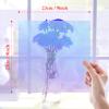 Prudiut 150 Pieces Iridescent Cellophane Sheets Blue Holographic Cellophane Wrap Iridescent Paper for Candy Gift Wraps DIY Crafts Art Lights Window Decoration (9 x 9 Inch) view 3