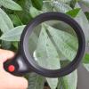 10X Handheld Magnifying Glass with Light, 18 LED Lighted Magnifier Reading Magnifying for Macular Degeneration Seniors Reading Inspection Coins view 2